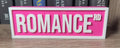 Romance Rd Bookshelf Sign