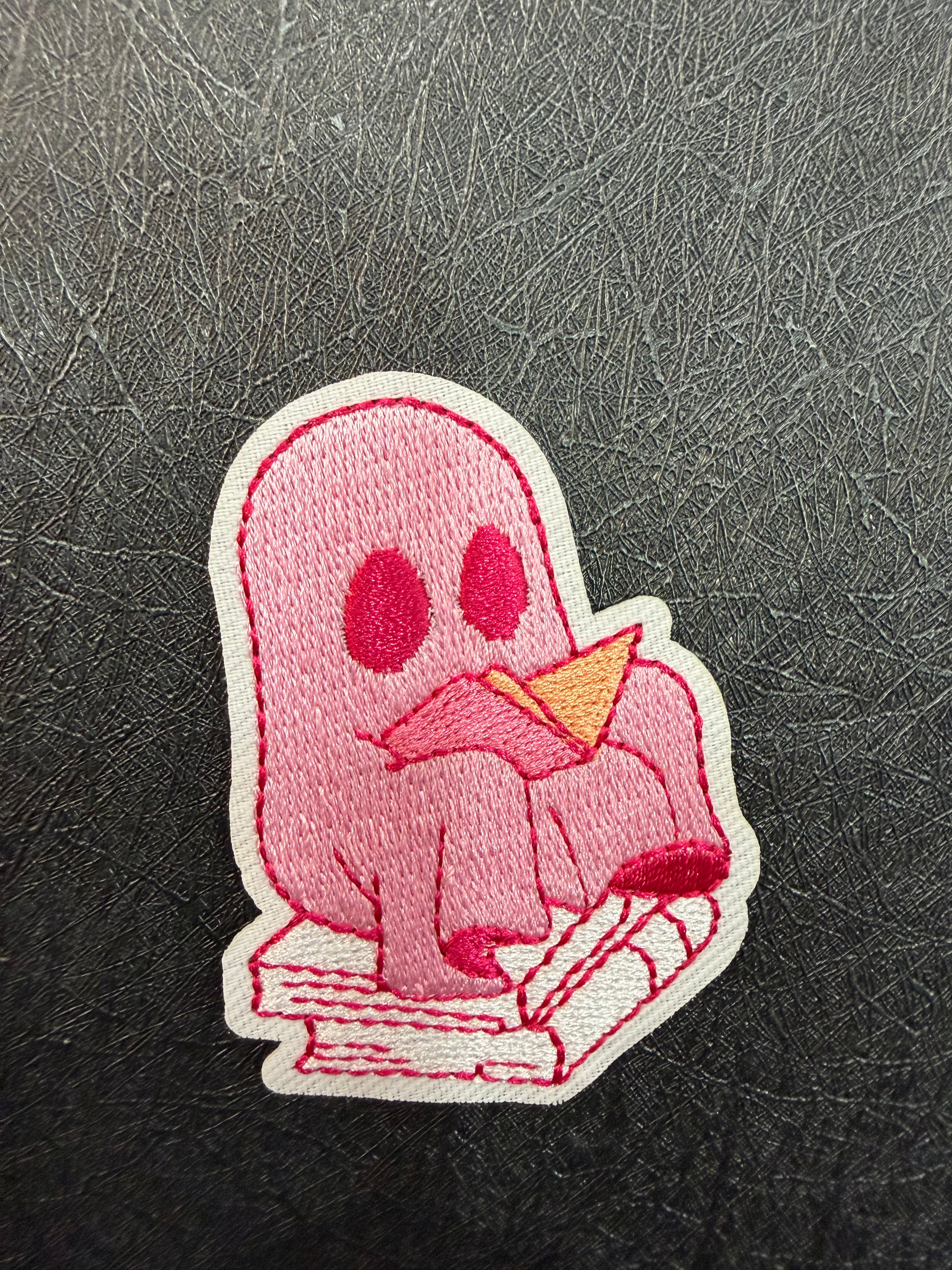 Pink Ghost Sitting on Books Patch